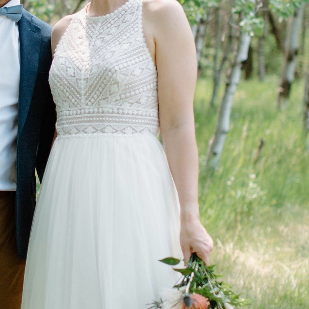 Stella York Ivory Lace Wedding Dress with lots of length - stain on back
